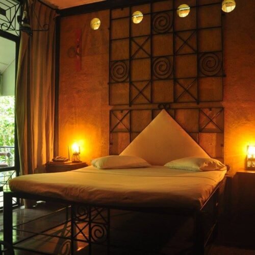 Luxurious cabana interior with comfortable seating and ambient lighting at Ambalama Leisure Lounge, Colombo
